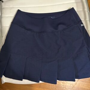 Like new PUMA TENNIS SKORTnavy blue highrise stretch tight fit built-in shorts